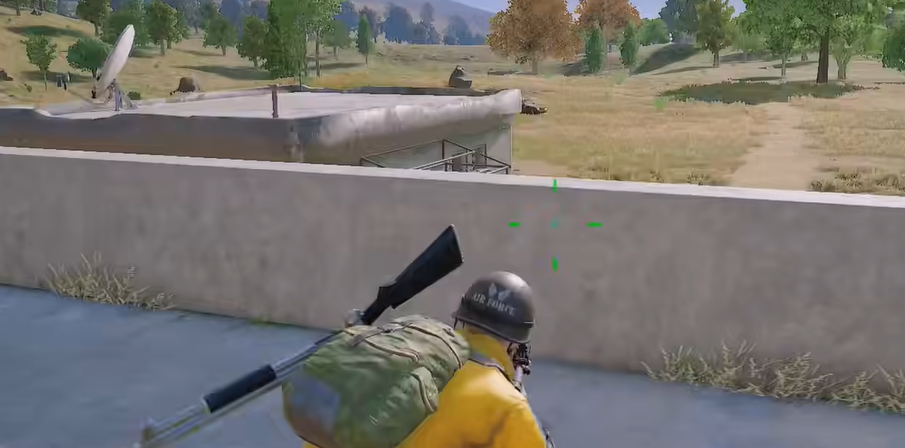 绝地求生怎么一边打一边蹲